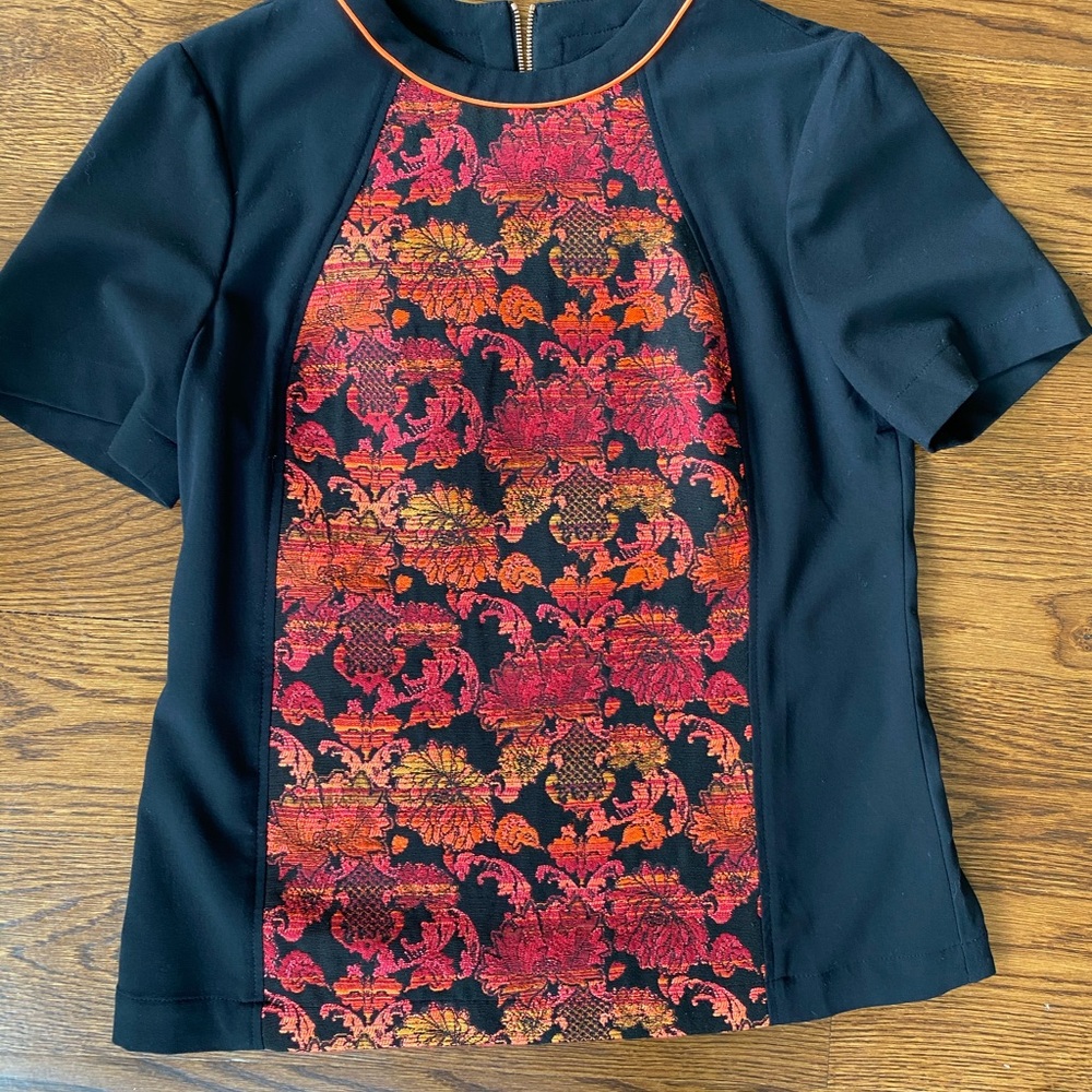 Red and orange floral pattern T-shirt